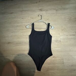 Aritzia black babaton bodysuit. Size small. Never worn